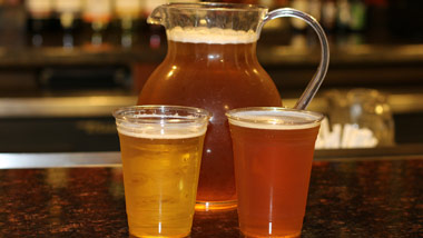 pitcher with two beers