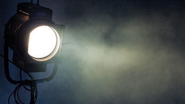 Spotlight shining through fog