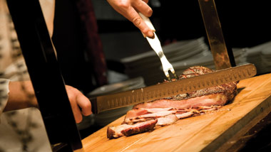 chef carving meat